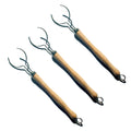 Three standard size Larga Vitae bamboo dish brush handles on a white background