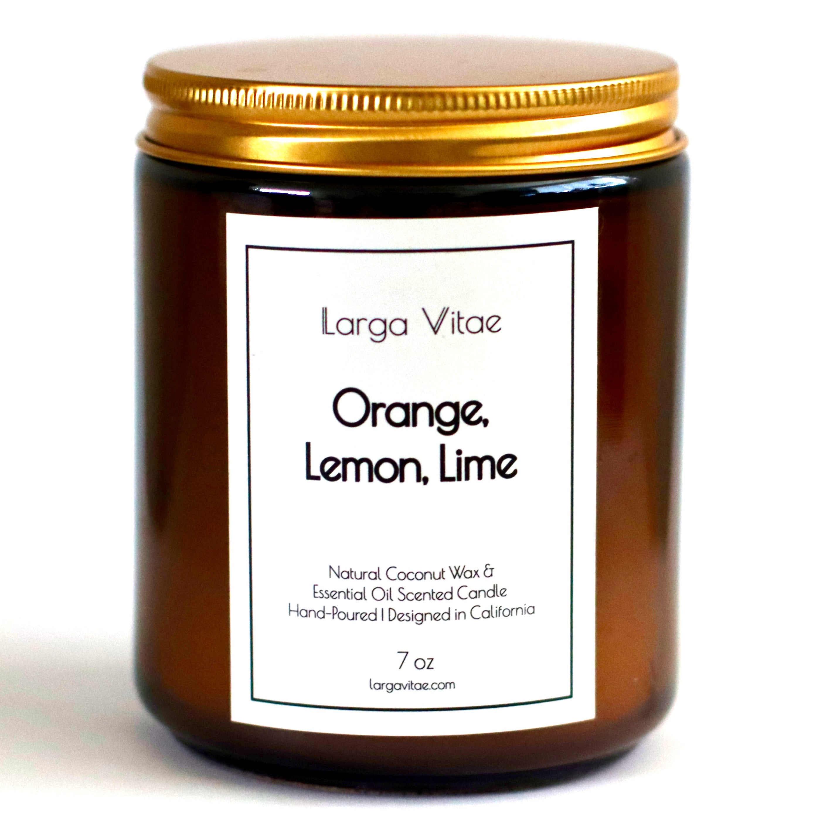 Larga Vitae's Orange, Lemon, Lime allergy friendly naturally scented candle jar with gold lid on a white background