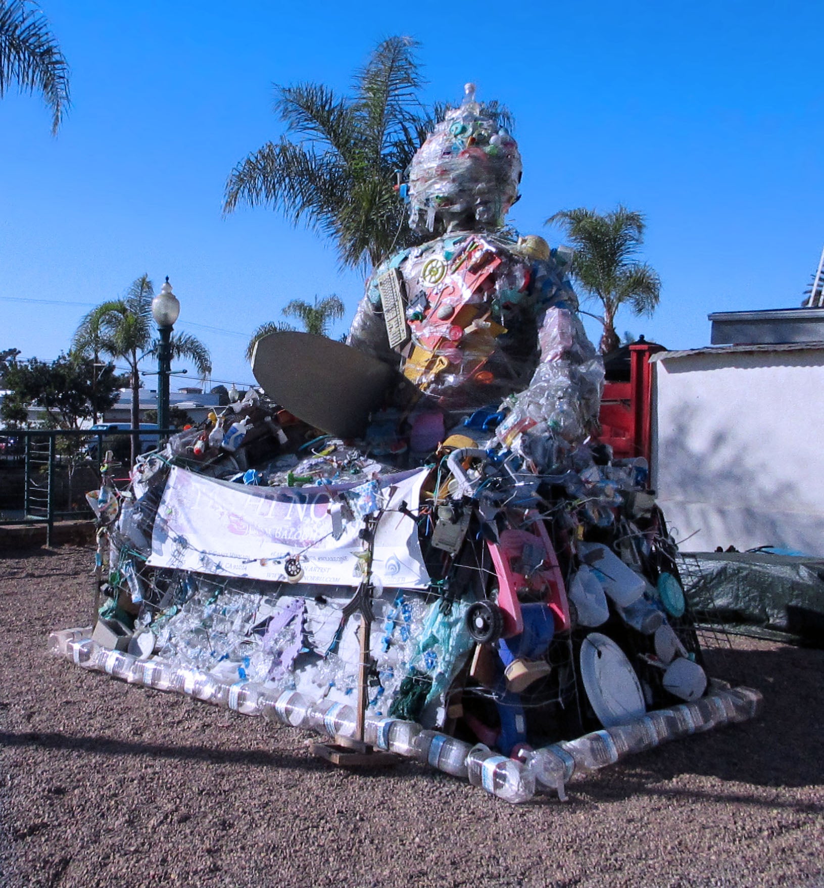 A buddha sculpture made of recycled trash at the Encinitas bazaar